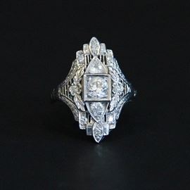 Antique 14K White Gold and Diamond Ring: An antique 14K white gold and diamond ring.
