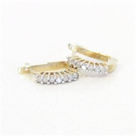 10K Yellow Gold and Diamond Earrings: A 10K yellow gold and diamond earrings.