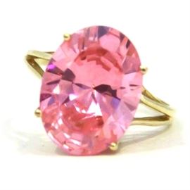 14K Yellow Gold Ring With Cubic Zirconia: A 14K yellow gold ring with cubic zirconia stone.