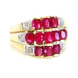 10K Yellow Gold, Ruby and Diamond Ring: A 10K yellow gold, ruby, and diamond ring.