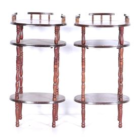 Pair Of Wooden Telephone Tables: A pair of wooden telephone tables. These two accent tables feature turned legs and accents, and are finished in a glossy walnut color.
