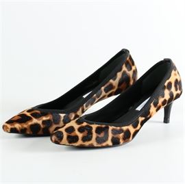 Diane Von Furstenberg Leopard Print Shoes: A pair of Diane Von Furstenberg leopard print heels. The shoes feature a pointed toe and a 2.25" heel. The heels have an official Diane Von Furstenberg label to the insole and are a size 7.