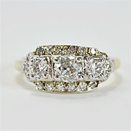 1.06 CTW Diamond Engagement Ring: A 1.06 ctw diamond engagement ring in an antique style 14K gold setting.
