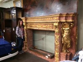Re-creation of a mantle in Versailles made of rouge marble, 24 karat gold ormolu and awesome details.