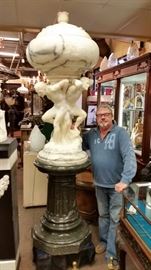 One-of-a-kind "Atlas" light made of alabaster, on marble pedestal.  Great centerpiece for a restaurant or grand residence. 
