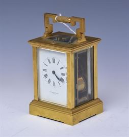 French Repeater Carriage Clock
retailed by Theodore Starr, NY
hour repeater
5 1/2" high excluding the handle
early 20th century