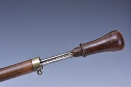 Victorian Sword Cane
19 12" blade, stamped "FRANZI..."
34 1/2" long overall
late 19th century