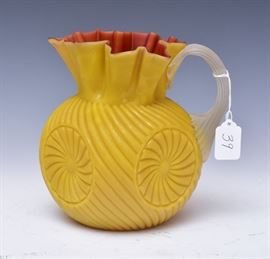 Victorian Art Glass Pitcher	
with pin wheel design
8" high
late 19th century