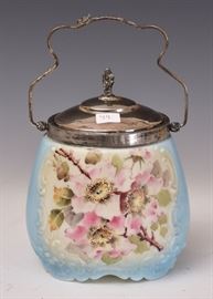 Wave Crest Biscuit Jar	
decorated on both sides with pink flowers
7 1/4" high (excluding the handle)
circa 1900
