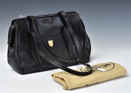 Five Ladies Handbags	
Mark Cross, 15" x 12" high, two Dooney & Bourke
and two Coach purses