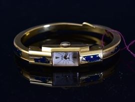 14k Gold Ladies Enameled Wrist Watch	
Spritzer Fuhrmann
8" wrist, 18.6 dwt gross