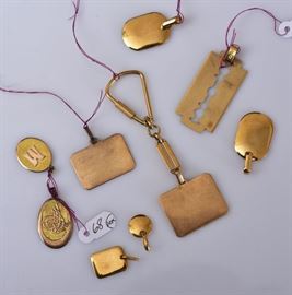 Group of 18k Gold Pendants (7)	
40.5 dwt together with
two 10k gold pendants, 2.5 dwt gross