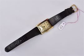 18k Gold Gent's Wrist Watch	
International Watch Co.
with second hand dial
1 1/8" long on a leather band