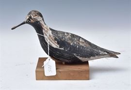 W. Ray Freden Carved Shore Bird Decoy	
paint decorated
11" long
signed on bottom