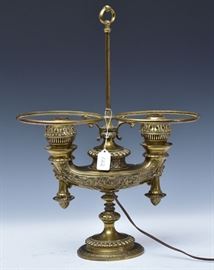 Harvard Double Student Lamp	
Aladdin style oil font
20" high
late 19th century