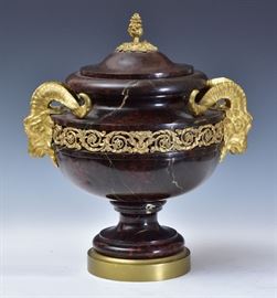 French Marble Cassoulet	
with gilt bronze ram's head handles and mounts
17" high, including the lid (approx 60lbs)
late 19th century