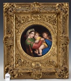 After Rafael, Madonna and Child Porcelain Plaque	
hand painted with carved gilt wood frame
7 1/2" x 7 1/2" plaque
17 1/2" x 15 1/4" overall
Germany, late 19th century