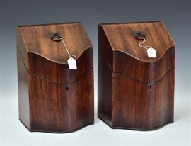 Pair of George III Mahogany Knife Boxes	
with star inlay on interior of lids and 
original fitted interiors, each 13" high
late 18th century