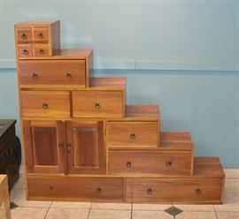 Stair Step Cabinet	
with 11 drawers
58 1/2" wide, 52" high