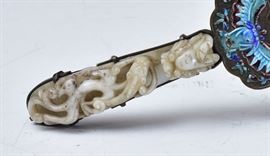 Chinese Enameled and Jade Mounted Hand Mirror	
enameled with birds and flowers
with dragon jade handle, formerly 
a belt hook, 5" long, 13 1/2" long overall
