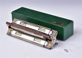 M. Hohner Tremolo Harmonica
10 3/4" long
in the original box