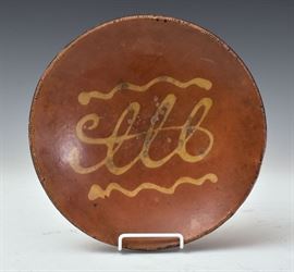 Slip Decorated Redware Plate
12 1/2" diameter
late 18th/early 19th century