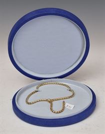 Piaget 18k Gold Necklace
with diamonds
15" long, 28.9 dwt gross
with the original box