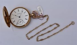 14k Gold Waltham Pocket Watch
1 7/8" diameter face
with gold fob, 6 dwt gross