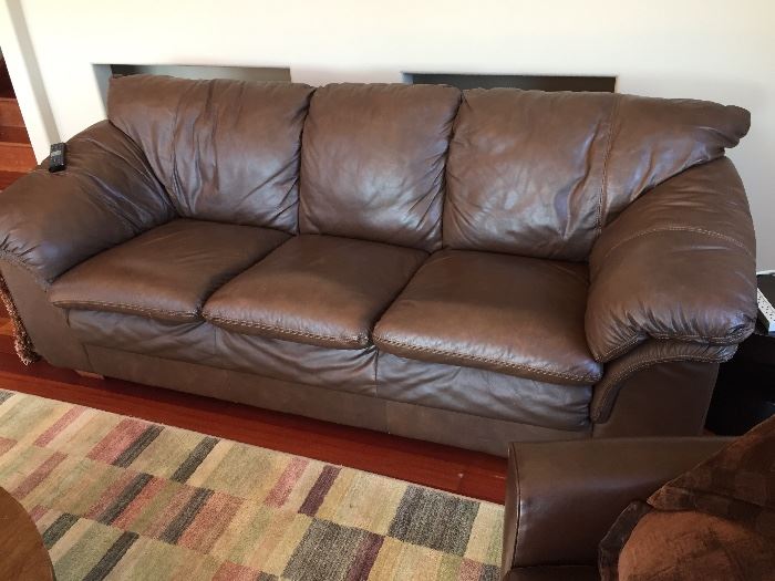 over stuffed leather sofa