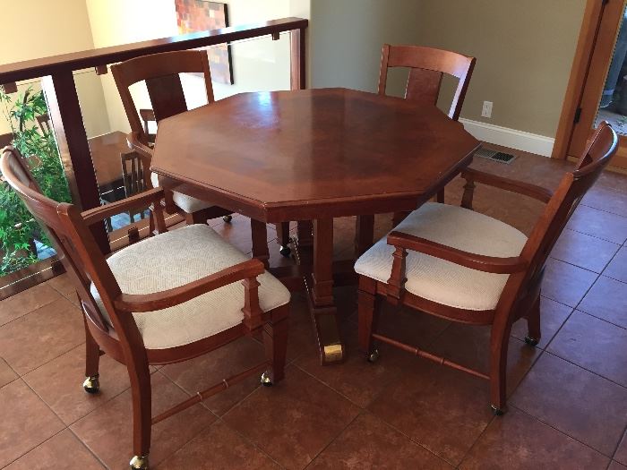 octagon dining table, 4 chairs on wheels 