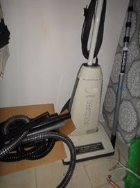 Upright vacuum (Riccar) model N2000 with extra hose and attachments
