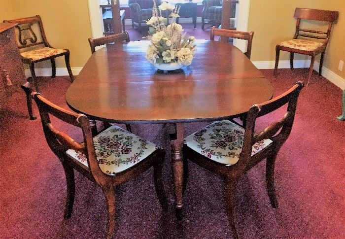 Antique dining table and 8 chairs