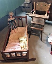 Antique doll cradle and high chair