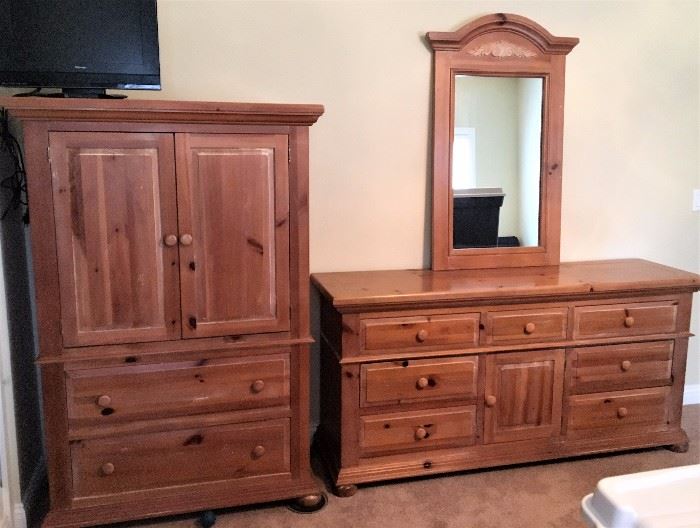 Broyhill pine wardrobe/entertainment cabinet and long dresser with mirror.