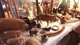 Owner collected pigs.  Pigs of all descriptions +other wooden carved objects.