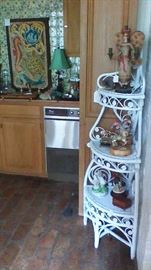 A well stocked bar plus wicker furniture.