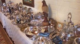 Excellent selection of silver plate:  nice ice bucket with tongs, Cruet set, unusual bowls, tea pots, platters, etc