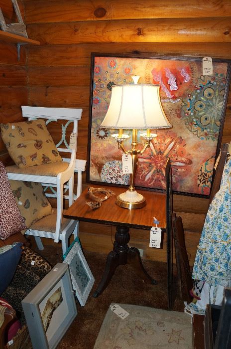 Yes, we are having to stack the furniture!  Side chairs, side table, art, Lenox lamp