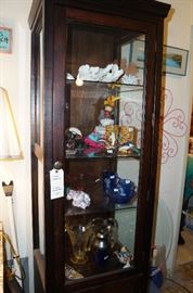 Nice curio with shells, glass, pottery