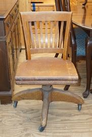Great old oak desk chair.  Weighs a ton, rolls nice.