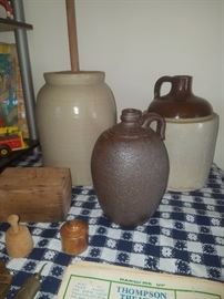 Pottery churn, jugs, butter molds, and more