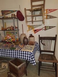 Pottery, vintage chairs, crate, egg basket, pennants, metal wind up toys, and much more