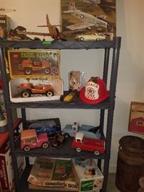 Motorized Cox toys including planes, Dune Buggy, Lotus car. Metal toys including Buddy L wrecker, Nylint Ford, pink Tonka Jeep, and much more