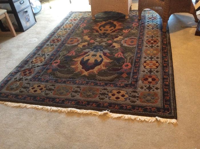 Plush floral wool area rug