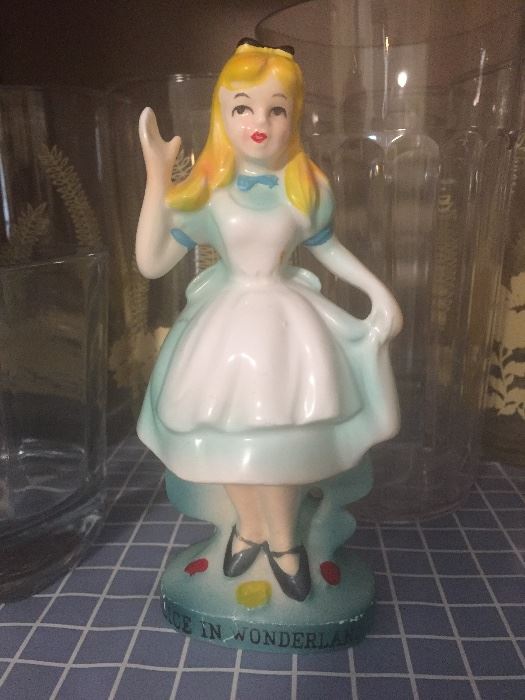 Vintage chalk Alice and Wonderland figurine.