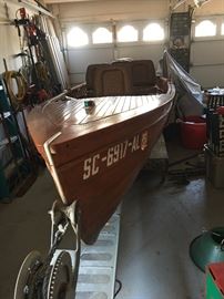 Wood boat in excellent condition. Garaged its entire life. 4 swivel seats