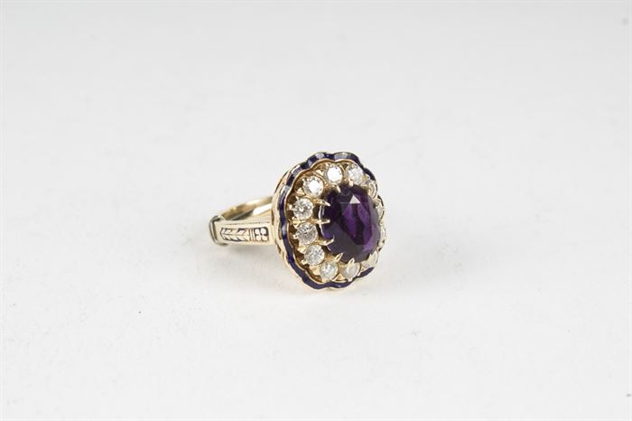 14K Gold, Amethyst and Diamond Ring: An 18K gold, amethyst and diamond ring.