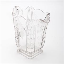 Etched Glass Pitcher: An etched glass pitcher. This piece features a square shape with etched leaf designs to the sides. The pitcher is unmarked.
