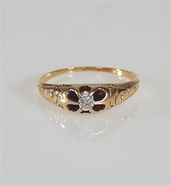 14K Yellow Gold Diamond Ring: A 14K yellow gold diamond ring.
