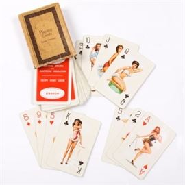 Vintage Pin-Up Playing Cards: A collection of vintage pin-up playing cards. Featuring a collection of promotional, linen grained, Norbrit (North British Book Lace Co. LTD) playing cards. Included are forty playing cards featuring different vintage images of pin-up girls.